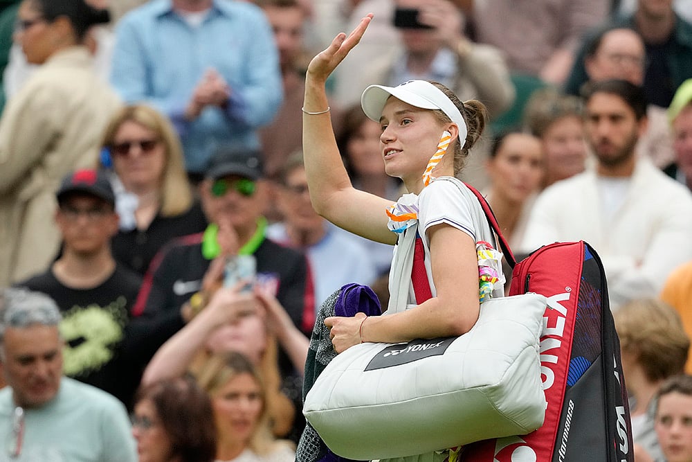 | Photo: Kirsty Wigglesworth : Elena Rybakina waves after defeating Anna Kalinskaya 
